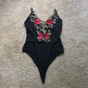 Rose embroidered body suit